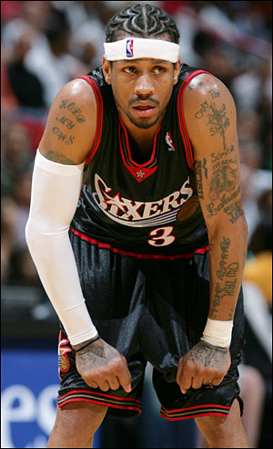 Allen Iverson has tattoos spread out all over 